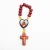 Rozaniec_na_palec_Jezus.webp